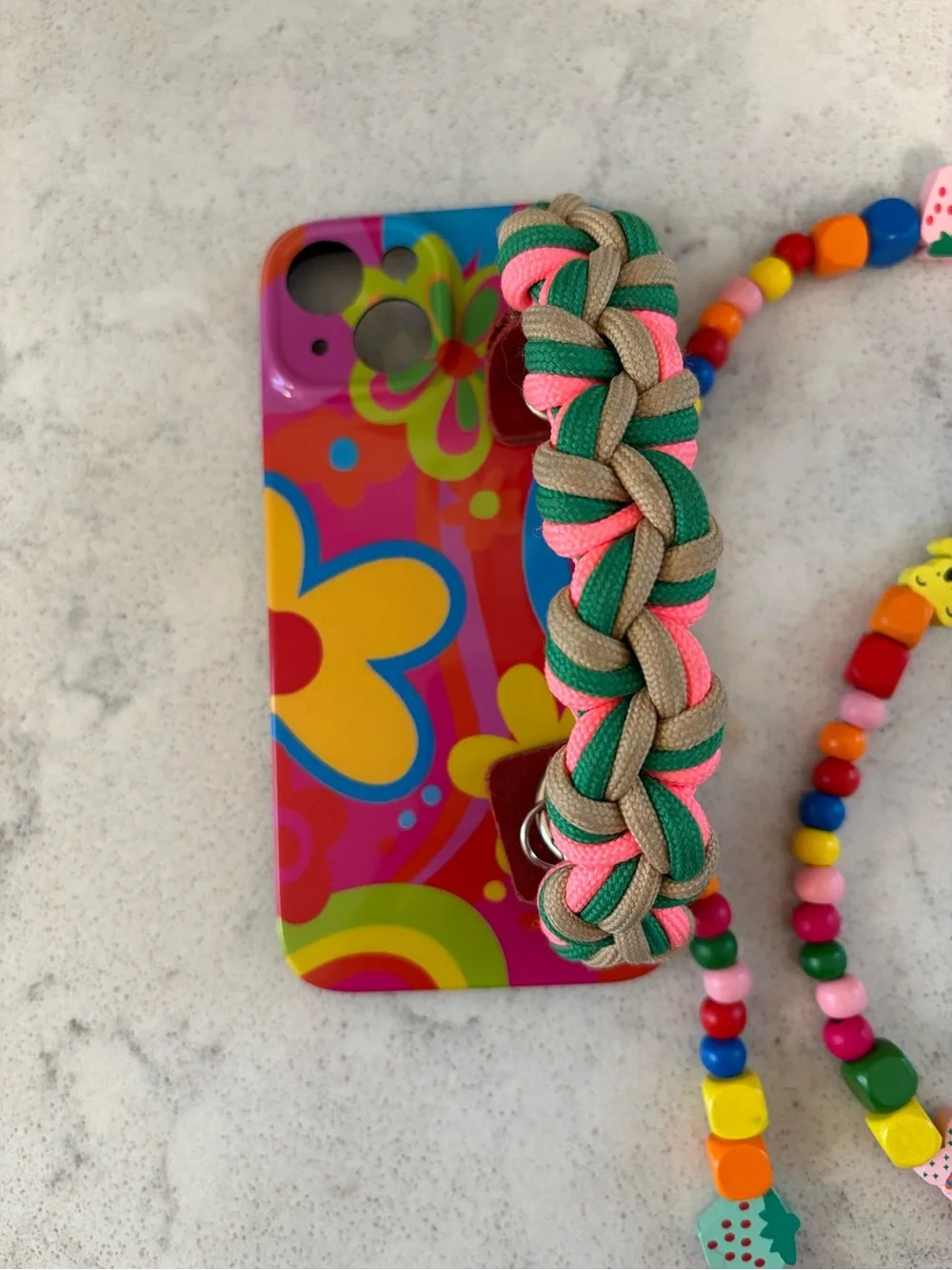 iPhone 15 case with handle and beaded strap
